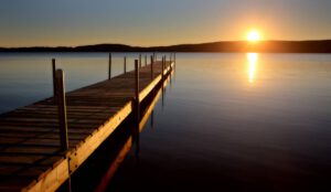 One of the things to do in Ontario, Canada is watch the sunset across one of the many lakes.